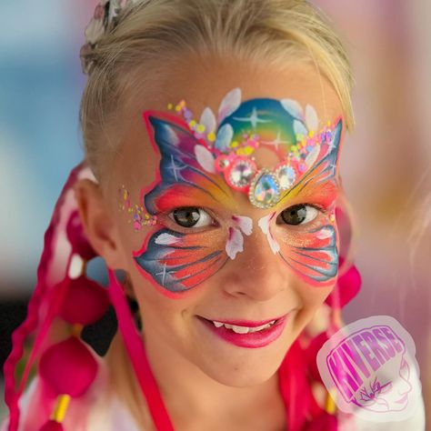 Rainbow butterflies are always pretty 🤩 🌈 Pink bubble braids made by me! #kiversefacepainting #facepaintbling #facepaint #facepainting #butterflyfacepainting #facepainting #rainbowfacepaint #facepaintbutterfly How To Face Paint Butterfly, Rainbow Face Paint, Rainbow Butterfly Face Paint, Half Butterfly Face Paint, Face Painting Aesthetic Butterfly, Facepainting Butterfly Simple, Bubble Braids, Rainbow Butterflies, Pink Bubbles