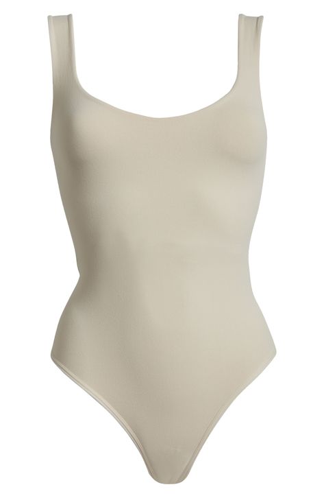 A sleek curve-hugging bodysuit featuring a dipped neckline and low U-back. Stretch fit Built-in shelf bra Snap gusset closure Thong cut 92% nylon, 8% elastane Machine wash, dry flat Imported Built In Shelves, Shelf Bra, Clean Lines, Built In, Free People, Nordstrom, Sleek, Size Medium, Bra