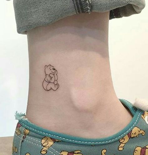 Little black and white Winnie the Pooh tattoo Winnie The Pooh Tattoo, Pooh Tattoo, Winnie The Pooh Tattoos, Septum Piercings, Disney Tattoo, Mermaid Tattoos, Waves Tattoo, Disney Tattoos, Tattoo Trends