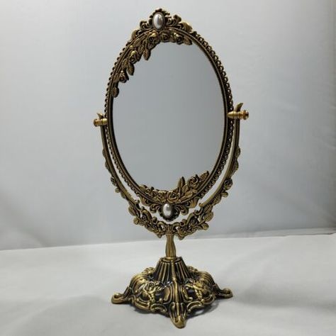 Find many great new & used options and get the best deals for Oval Ornate Freestanding Vanity Mirror Brass Frame Retro Vintage Antique Style at the best online prices at eBay! Free shipping for many products! Antique Vanity With Oval Mirror, Vintage Vanity Mirrors, Vintage Frame Mirror, Antique Gold Bathroom Mirror, Vintage Gold Home Decor, Vintage Desk Mirror, Mid Century Mirrors, Antique Chic Decor, Brass Antique Decor