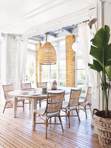 Eclectic loft-style dining room with wicker chairs via Thou Swell #interior #interiordesign #bohemian #boho #diningroom #dining Modern British Colonial Decor, Modern British Colonial, Tropical British Colonial, Colonial Style Interior, British Colonial Decor, Modern Colonial, Dining Room Spaces, British Colonial Style, Outdoor Dining Room