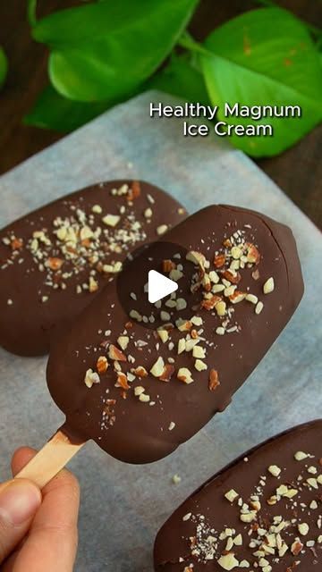 Jaida Ow on Instagram: "Healthy Magnum Ice Cream 🍦honestly, nothing beats that first bite into the chocolate shell 🤤✨

🥣Ingredients:
For Ice Cream Base:
2 ripe bananas, peeled
2 tbsp peanut butter
150g Greek yogurt
50ml milk
1 tsp coconut oil

For Coating:
200g milk chocolate
1 tsp coconut oil
Almond nuts, blended

📝 Steps:
1. Blend all the ingredients for the ice cream base until smooth.
2. Pour into molds, insert sticks, and freeze for 4-6 hours until set.
3. Double boil the chocolate until melted and smooth. Add coconut oil.
4. Remove bars from molds, dip in melted chocolate, and place on parchment paper. Freeze for 15-20 minutes to set." Healthy Magnum Ice Cream, Magnum Ice Cream Bars, Yogurt Banana, Magnum Ice Cream, Cream Custard, Ice Cream Bars, Ice Cream Pops, Ice Cream Base, Greek Yogurt Recipes