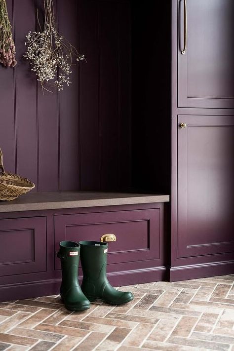 Purple mudroom with brick herringbone pavers features purple cabinets with brass pulls and a purple bench with purple stone top. Brick Herringbone Floor, Whittney Parkinson Design, Whittney Parkinson, Herringbone Brick Floor, Purple Cabinets, Transitional Laundry Room, Gold Light Fixture, Purple Kitchen, Tudor Style Homes