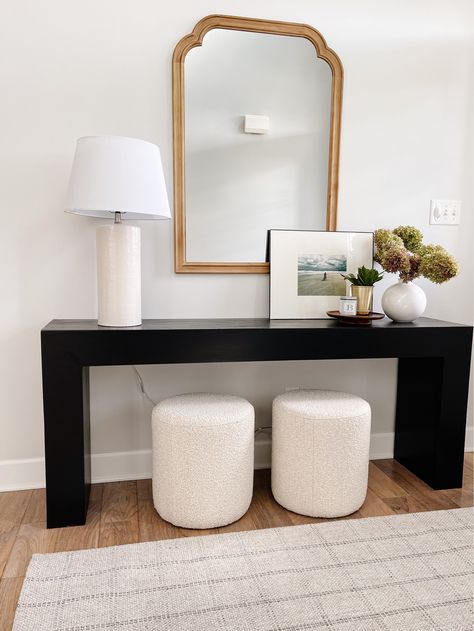 Entryway Console With Ottoman, Ottoman Entryway Ideas, Entryway Ottoman Ideas, Entry Table With Ottomans Under, Ottoman Bench Decor, Ubud Console, Black Console Table Entryway, Mid Century Entryway Ideas, Black Entryway Table