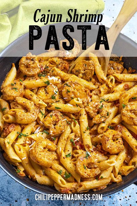 This Cajun shrimp pasta is loaded with succulent shrimp and comforting noodles simmered in a creamy, spicy tomato sauce, perfectly spiced and easy to make! Creamy Cajun Spaghetti, Cajun Shrimp Pasta Easy, Spicy Cajun Shrimp Pasta, Recipes With Shrimp And Pasta, Cajun Shrimp Recipes For Dinner, Chipotle Shrimp Pasta, Cajun Chicken Shrimp Pasta, Shrimp Cajun Pasta, Shrimp Pasta Salad Recipes