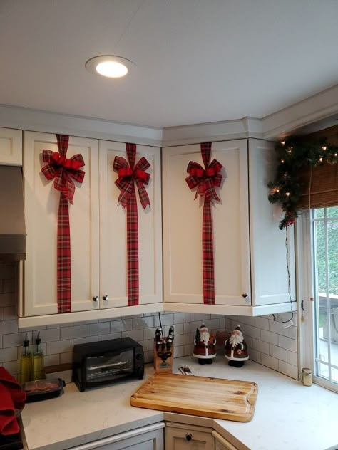 My new plaid ribbon for 2020 holidays Christmas Cabnit Decorations, Christmas Cabinets Ribbon, Kitchen Cabinet Christmas Decor Ribbons, Kitchen Cabinet Ribbon Christmas, Christmas Ribbon Cabinets, Christmas Present Cabinets, Ribbon Kitchen Cabinets, Christmas Bow Cabinets, Ribbon Cabinet Christmas