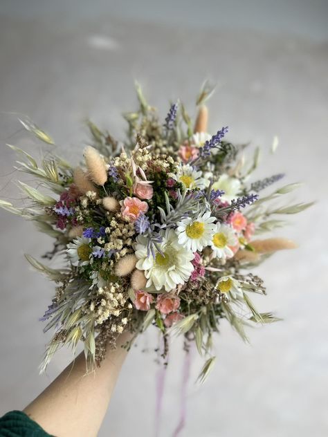 Handmade flower bouquet made from artificial flowers and preserved materials in meadow style... #bouquet #bridalbouquet #bouquetinspo #spring #springwedding #summerwedding #summerflowers #summerbride #meadowflowers #wildflowers #flowershop #lavender #daisyflower #bridetobe #weddingday #weddingdesigner Dried Lavender Wedding Bouquet, Dried Flower Bouquet Sunflower, Lavander Dried Flower Bouquet, Yellow Dried Flower Bouquet, Lilac Dried Flower Bouquet, Lavender Bridal Bouquet, Floral Hair Wreath, Flower Headband Wedding, Bridal Flower Headband