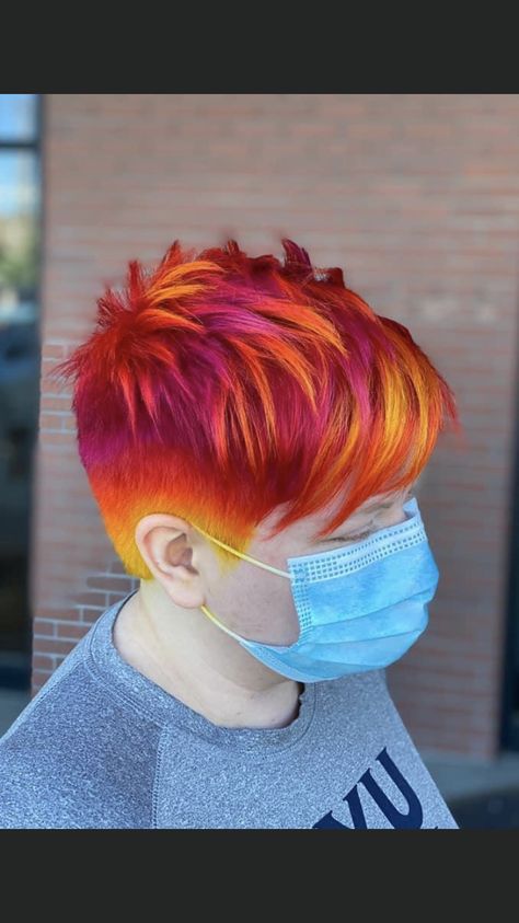 Orange Hair Ideas For Short Hair, Fire Hair Men, Fire Pixie Hair, Sunset Hair Color Short Pixie, Short Bright Colored Hair, Spring Vivid Hair Color, Fire Ombre Hair Short, Sunset Short Hair, Bright Hair Colors Short