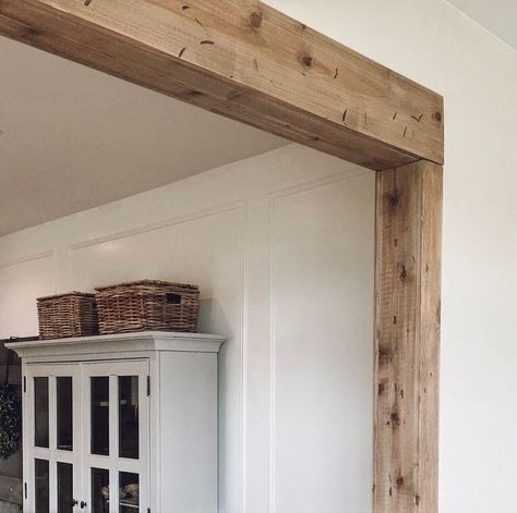 Faux Barnwood Beam Doorway | $100 DIY Projects Reclaimed Wood Archway, Rustic Door Trim Ideas, Wood Beam Cased Opening, Interior Archways Ideas, Living Room Archway Ideas, Farmhouse Molding And Trim, Archway Trim, Beam Doorway, Farmhouse Molding