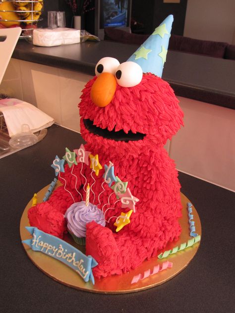 Tracee-  Im pinning this one for you.  It's the cake I've been talking about, I LOVE IT!!  Party Elmo - This is the cake i made for my daughters 1st birthday on the weekend.  Elmo's body is cake and the head, arms and legs are RKT.  The whole thing is covered in buttercream.  Had alot of fun making this cake. Elmo Birthday Cake, Cake Competition, Sesame Street Cake, Elmo Cookies, Elmo Cake, Elmo Birthday Party, Sesame Street Birthday Party, Elmo Party, Sesame Street Party