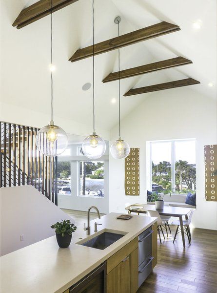 Exposed Collar Ties, Beam Ceiling Lighting, Mandy Cheng, Vaulted Kitchen, Neighborhood Ideas, Concrete Worktop, Vaulted Ceiling Beams, Pocket Neighborhood, Lodge Lighting