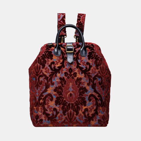 Embrace timeless elegance with MCW's Victorian-inspired carpet laptop backpack, where classic design meets modern functionality. This unique bag beautifully blends the charm of traditional carpet bags with contemporary textures for a striking statement piece. Crafted from thick carpet fabric or rich burnout velvet, the main body exudes luxury and durability. Genuine leather handles and belts, complemented by a sturdy cotton canvas lining, ensure both comfort and style. Inside, a padded cotton la Eclectic Townhouse, Dream Backpack, Elegant Backpack, Carpet Bags, Inspiration Story, Traditional Carpet, Carpet Fabric, Burnout Velvet, Fantasy Closet