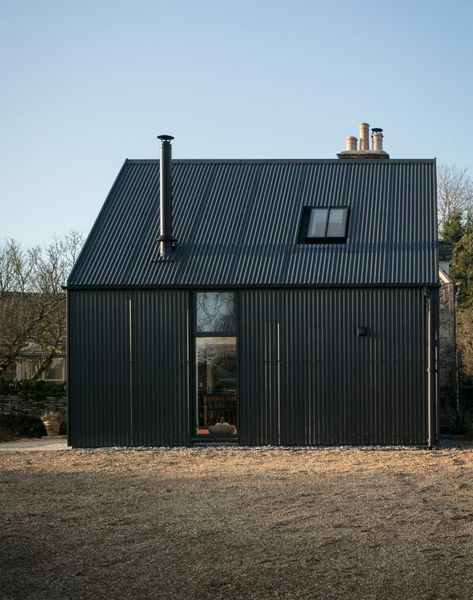 Eastabrook Architects adds corrugated metal extension to Cotswolds cottage Corrugated Iron House Exterior, Zinc Cladding, Corrugated Metal Siding, Cottage Extension, Corrugated Steel, Cotswolds Cottage, House Cladding, Manor Farm, Metal Cladding