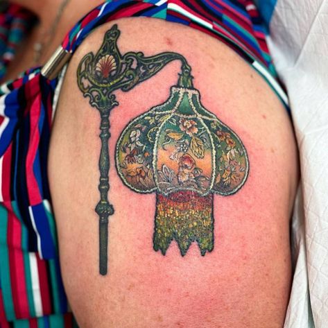 Lamp tattoo on the shoulder. Mostly healed some fresh. Nursing Lamp Tattoo, Lady With The Lamp Tattoo, American Traditional Lamp Tattoo, Lamp Tattoo Design, Old Lamp Tattoo, Tattoo On The Shoulder, Lamp Tattoo, Home Objects, Light Tattoo