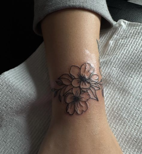 wrist tattoo ✨ Tattoos For Small Hands, Date On Wrist Tattoo, Floral Wrist Band Tattoo, Cover Up Tattoos On Wrist, Flowers And Cross Tattoo, Tattoos For Girls On Wrist, Front Wrist Tattoos For Women, Side Of Wrist Tattoos For Women, Hand Tattoo Women