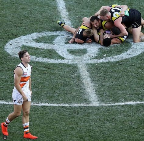 Richmond players celebrating the 2019 Grand Final win, Toby Greene from Greater Western Sydney lamenting the loss. Maxey Greene, Greenys Grand Game, Ford And Wyatt, Toby Cavanaugh Season 1, Dustin Martin, Richmond Afl, Richmond Football Club, Richmond Tigers, The Low