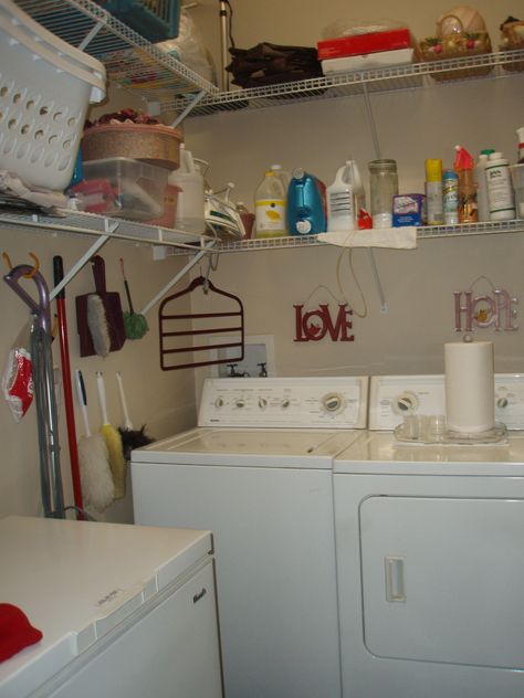 BEFORE...TINY, very messy laundry room with wire shelves;  side by side washer and dryer.  With the chest freezer in this tiny laundry room, there wasn't room to move. Messy Laundry Room, Tiny Laundry Room, Tiny Laundry, Tiny Laundry Rooms, Wire Shelves, Chest Freezer, Wire Shelving, Washer And Dryer, Side By Side