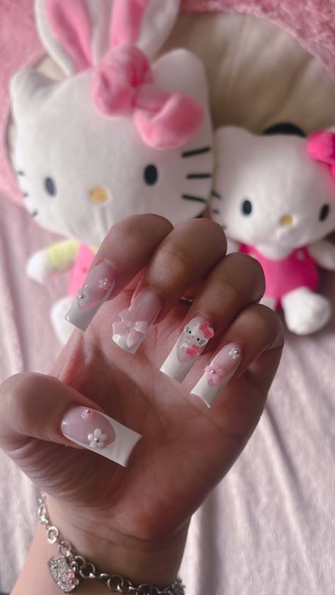 Nail Ideas Acrylic Charms, French Tip With Hello Kitty Charm, Light Pink Hello Kitty Nails, Hello Kitty Coquette Nails, Small Hello Kitty Nails, Hello Kitty Simple Nails, Kid Nails Acrylic, Hello Kitty Nails Medium Length, Basic Hello Kitty Nails