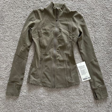 Size 2, Brand New With Tag. Color Nomad. Green Sports Aesthetic, Green Define Jacket, Lululemon Outfit Ideas, Unrealistic Wishlist, Lulu Outfits, Long Hooded Jacket, Riding Clothes, Lululemon Outfits, Lululemon Define