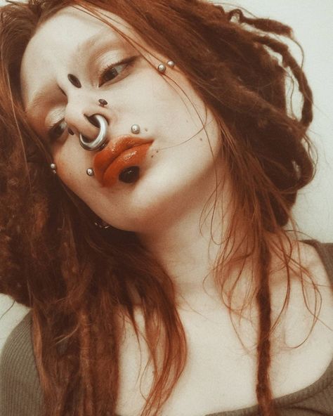 Girl with red hair and huge stretched septum and stretched bridge piercing
Silver face piercings Big Septum Piercing, Floating Nomad, 3 Lobe Piercings, Body Modification Piercings, Stretched Septum, Facial Pictures, Bridge Piercing, Septum Rings, Face Piercings