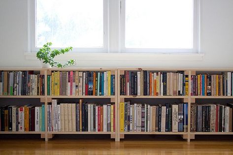 This is pretty much my dream bookshelf. Just so you know. {photo by Silvia Song} Bookshelves Low, Long Low Bookcase, Window Bookcase, Bookcase Ikea, Horizontal Bookcase, Bookshelf Makeover, Low Bookshelves, Low Bookcase, Diy Furniture Bedroom