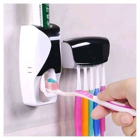 It a picture of a toothpaste dispenser and brush holder Wall Mounted Toothbrush Holder, Space Saving Bathroom, Toothbrush And Toothpaste Holder, Toothpaste Squeezer, Toothbrush Storage, Bathroom Gadgets, Toothpaste Holder, Sikat Gigi, Bathroom Toothbrush Holder