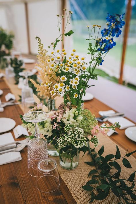 South Yorkshire Farm Wedding Amy Jordison Photography Burlap Hessian Table Runner Wildflowers Centrepiece Decor Marquee #wedding #weddingdecor Wildflowers Table Decor, Rustic Table Display, Hessian Runner Wedding, Wild Flower Table Arrangements, Wild Flower Rustic Wedding, Meadow Wedding Table, Simple Wildflower Table Setting, Rustic Marquee Decoration, Wedding Wildflowers Decoration