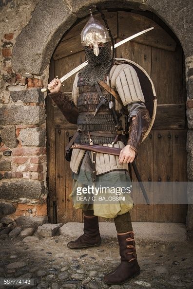 Viking warrior with helmet leather armour and gambeson sword and shield 10th century Historical reenactment Leather Armour, Viking Armor, Historical Armor, Historical Reenactment, Leather Armor, Knight Armor, Norse Vikings, Medieval Armor, Medieval Clothing