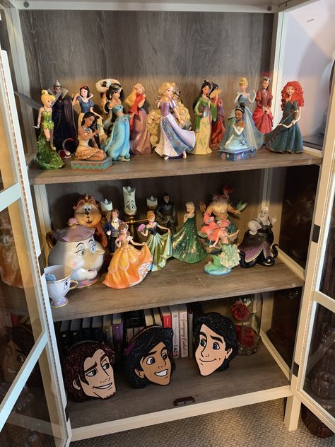 Purses and figurine collection from the Disney store & Amazon .# Disney figurine enesco, Disney Showcase Collection, Disney Collection Display, Disney Themed Rooms, Princess Accessories, Enesco Figurines, Disney Room Decor, Doll Museum, Disney Figures, Themed Rooms