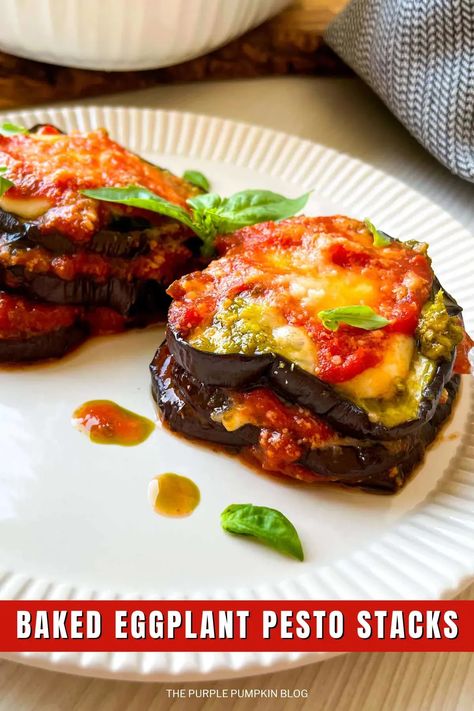 Impress your guests with these Elegant and Easy Baked Eggplant Pesto Stacks. Sliced eggplant, layered with marinara sauce, aromatic basil pesto, and a golden blanket of melted mozzarella cheese, create a visually stunning and deliciously satisfying dish. Perfect for a dinner party or a cozy evening at home. Discover the recipe on The Purple Pumpkin Blog. #ElegantEggplantStacks #PestoDelight #DinnerPartyFood Pesto Eggplant, Eggplant Pesto, Eggplant Stacks, Eggplant Parmesan Recipe, Eggplant Recipes Parmesan, Purple Pumpkin, Baked Eggplant, Classic Italian Dishes, Eggplant Parmesan