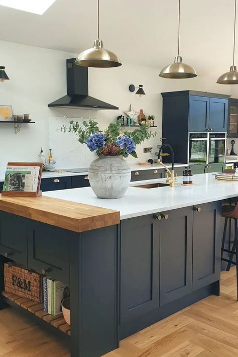 In need of blue kitchen inspiration or shaker kitchen inspiration? @home_at_51's Chilcomb Navy Kitchen is perfect for your blue kitchen ideas and traditional kitchen ideas. The white quartz worktop, solid oak worktop block and aged brass hardware are perfect for creating a traditional kitchen design. Add your favourite home decor, a black and brass kitchen tap and oak herringbone flooring to create a rustic kitchen design with a modern kitchen design twist. Blue Kitchen Interior, Blue Shaker Kitchen, Kitchen Diner Extension, Navy Kitchen, Open Plan Kitchen Dining Living, Open Plan Kitchen Diner, Kitchen Decor Inspiration, Open Plan Kitchen Dining, Fortnum Mason