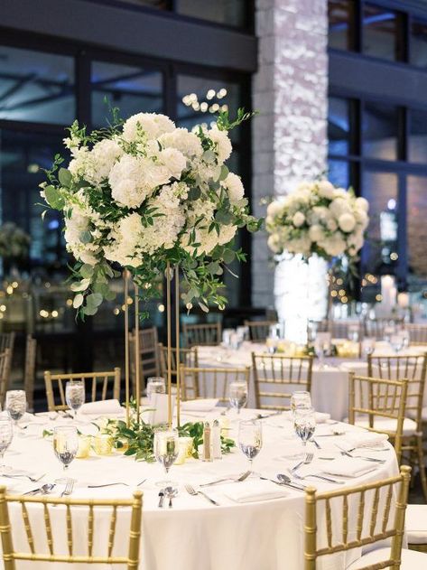 Mar 10, 2021 - Tall floral centerpieces for wedding reception on gold stands. Tall Floral Centerpieces, Tall Flower Centerpieces, Gold Wedding Centerpieces, Centerpieces For Wedding, White Floral Centerpieces, White Wedding Decorations, Elegant Wedding Centerpiece, Tall Wedding Centerpieces, Gold Centerpieces