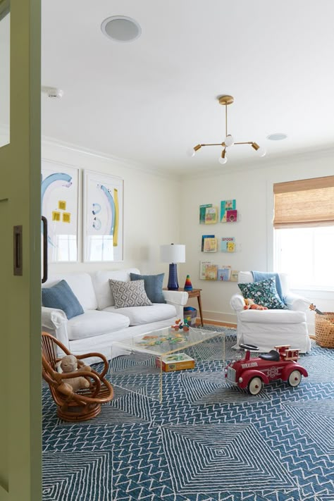 Playroom With Sitting Area, Window Cubby Ideas, Rh Playroom, Game Nook In Living Room, Multiage Playroom, Playroom Living Room Combo Layout, Family Den Ideas, Playroom Family Room Combo, Loft Playroom Ideas Upstairs