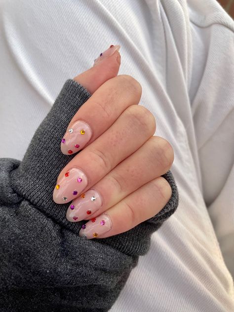 Nude nails with five colorful gem stones on each nail for the holidays New Years Nails Sparkly, Gem Stone Nails, Stone Nails, Nails Sparkly, New Years Nails, Minimal Nails, Gem Nails, New Year's Nails, Gem Stone