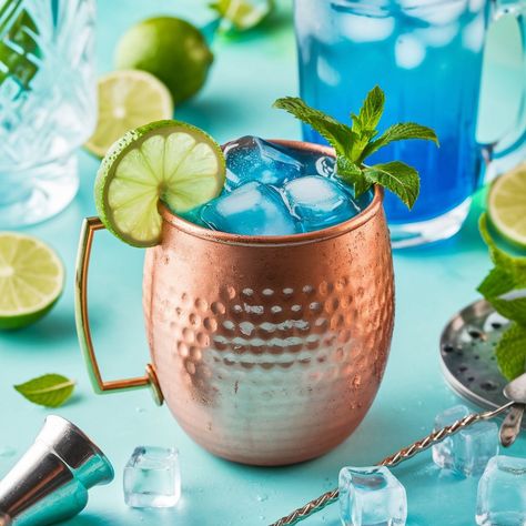 Frosty Blue Mule Cocktail Recipe: Chill Out with This Refreshing Twist - Thirsty Tales Mule Cocktail, Chanukah Party, Refreshing Cocktail, Winter Cocktails, Blue Curacao, Christmas Brunch, 2024 Christmas, Blue Winter, Christmas Cocktails