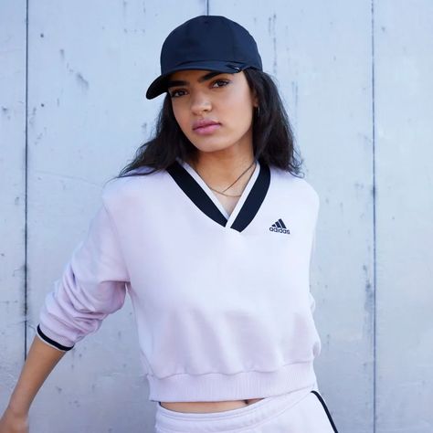 Carry the energy of community wherever you go in the new 'This City is Ours' collection. Pulling from the legacy of collegiate style, the lineup celebrates authentic connections, the team spirit in the heart of our cities — and the pride found in showing off your true stripes. The Cropped V-Neck Sweatshirt is a sportswear take on preppy dressing. Made from extra-soft French terry fabric, the cozy top works for down-tempo days and catch-ups with your closest. A contrasting colored stripe on th Adidas Hoodie Women, Collegiate Style, Adidas Sweater, Adidas Crop, Blue Crewneck, Yellow Sweatshirt, The Pride, Adidas Hoodie, Terry Fabric