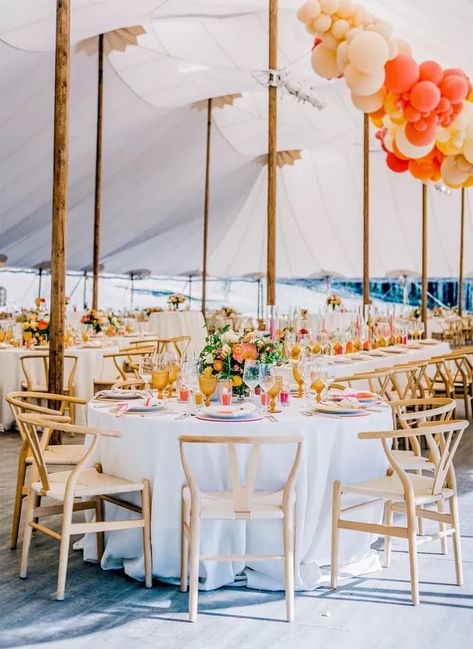 Want your wedding to pop without it being too much? Add neon pinks and bright oranges with stark white tablecloths and wooden wishbone chairs. The look is playful, inviting, and perfect for a summer wedding. See more stunning round table wedding décor ideas at the link. // Photo: Meg Smith Photography Round Table Wedding, Round Table Centerpieces Wedding, Bright Wedding Decorations, Round Table Settings, Round Table Centerpieces, Round Wedding Tables, Round Table Decor, Tall Wedding Centerpieces, Simple Centerpieces