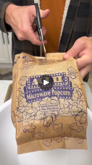 Simple Holiday Popcorn!  🎬 This video was produced by Network Media and Derek's Creations | By Storytime | Got our Act 2 buttered Popcorn. Gonna pour this into a bowl and then we're going to grab our second bag. I can drink this one. Or Oh yeah. Alright. Two bags of that. We're going to make some Christmas popcorn. You ready for this? We got some pretzels. We're going to do couple handfuls of that. Nothing major. Sorry my dog's barking. I think he sees a cat or something. Got some Christmas MandM's here. Pour those in there. Oh yeah. And then last step we're going to add some classic white cake mix. Just a half cup of that. Gonna pour that on in here. Alright then grab your clean hands. Let's go in here. Make sure this all gets soaked in there real nice. This stuff is going to taste so go Christmas Popcorn Decoration, Making Popcorn In A Paper Bag, Christmas Goody Bag Ideas, Christmas Movie Snacks, Almond Bark Popcorn, Best Brunswick Stew Recipe, Popcorn Snack Mix Recipes, Oreo Popcorn, Classic White Cake