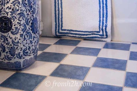 Blue and white ceramic tile floor | How To Beautify a Boring Builder Grade Bathroom White Ceramic Tile Floor, White Tile Bathroom Floor, Vintage Bathroom Floor, Square Tile Bathroom, Builder Grade Bathroom, Ceramic Tile Floor Bathroom, Ceramic Floor Tiles Living Room, Blue Floor Tile, Blue Tile Floor