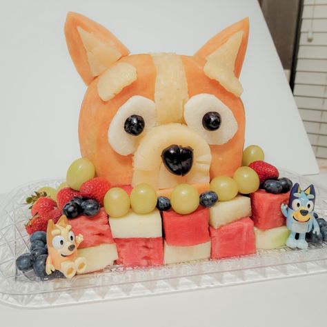 Birthday cake alternative idea. Fresh Fruit arrangement in the shape of Bluey's sister, Bingo. Make smaller sizes for fruit platters to serve to guests at your party. #bluey #bingoheeler #blueycake #blueybirthday #puppyparty Bluey Themed Fruit Tray, Bluey Fruit Tray, Bingo Bluey Birthday Party Theme, Bluey Dessert Table Ideas, Bluey Snacks, Bingo Bluey Birthday, Bluey Food Ideas, Bluey Unicorn, Bluey Birthday Party Cake