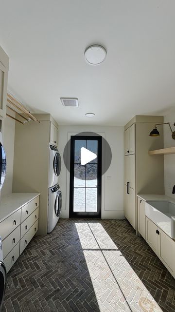 Kelly Griffiths on Instagram: "Laundry room must haves! Save for later and watch a mini tour for what to include in your remodel or new build.   1. Door - pocket doors allow for space saving space. Doors help block noise from@washer/dryer.   2. Outlets in at least one cupboard for charging your cleaning appliances like vacuums etc.   3. Tall storage for mops, vacuums.  4. Pull out trash and dog food (if you are a pet owner).  5. Drying racks and or drawers that can be put away for a clean look.   6. Deep sink for soaking laundry etc.   7. Double washer dryers, use stackable for space saving.   8. Access to outside if you like to hang dry outside.   #laundry #laundryroom #laundryroommakeover #laundryday #laundrydesign #brickfloor #dry #drying #hangdry #storage #vacum #mop #cleaning #cleanin Walk Thru Laundry Room From Garage, Laundry Room Must Haves, Outside Laundry, Washer Dryer Closet, Brick Herringbone Floor, Room Must Haves, Deep Sink, Stackable Washer And Dryer, Laundry Design