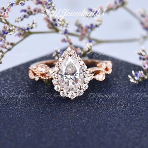 1.6ct Pear Shaped Moissanite Engagement Ring Set Diamond Halo Ring Woman Rose Gold Vine Flower Milgrain Ring Half Eternity Anniversary Gift Items Description: * Handmade, high-quality item! * Material: SOLID 14K/18K GOLD (can be made in white/rose/yellow gold) Engagement Ring: * Center stone: Moissanite, Pear Shaped 6*9mm, approx. 1.6 CT * Accents: Natural Diamonds, VS clarity, G color, 0.32ct Total Or Colorless Moissanites, DE color, VVS clarity Natural Fresh Water Pearl * Band width approx 2.2 Commitment Rings, Milgrain Ring, Moissanite Engagement Ring Set, Future Engagement Rings, Diamond Halo Ring, Women Rising, Yellow Gold Engagement, Yellow Gold Engagement Rings, Rose Yellow