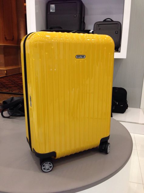 Rimowa carry on in yellow ltd edition Yellow Suitcase Aesthetic, Yellow Luggage, Yellow Suitcase, Clothes Wardrobe, Bucket Lists, 2024 Vision, Travel Life, Travel Luggage, Travel Accessories