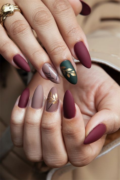 Embrace the essence of autumn with these chic matte burgundy nails窶蚤n elegant choice for your fall nail ideas. The captivating deep red hue not only exudes sophistication but also pairs beautifully with cozy sweaters and warm drinks. Perfect for any occasion, these nails will instantly elevate your style. Get inspired and step into fall with confidence! Matron Of Honor Nails, Matte Burgundy Nails Almond, December Nails Matte, Fall Nails Wine Color, Vintage Fall Nails, Fall Wine Nails, Maroon Manicure, Maroon Fall Nails Burgundy, Fall Maroon Nails