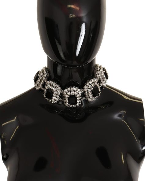 Dolce & Gabbana Elegant Crystal Choker Necklace https://www.thegraycrab.com/products/dolce-gabbana-elegant-crystal-choker-necklace Adorn your neckline with the epitome of elegance with this stunning Dolce & Gabbana choker necklace. This accessory is the perfect blend of luxury and craftsmanship, featuring a dazzling mix of clear and black crystals set against a lustrous silver-tone backdrop. Its exquisite design secures with a lobster clasp closure, ensuring a comfortable fit for any specia... Crystal Choker Necklace, Crystal Accessories, Crystal Choker, Crystal Set, Fantasy Inspiration, Silver Crystal, Watch Necklace, Black Crystals, Exquisite Design