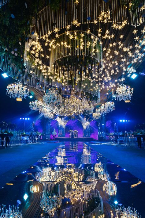 A stunning wedding reception decor featuring a custom-designed ceiling installation made up of crystals, stars and chandeliers. Ceiling Wedding, Wedding Ceiling, Wedding Reception Design, Wedding Reception Decor, Ceiling Treatments, Reception Design, Ceiling Installation, Backdrop Design, Reception Decor