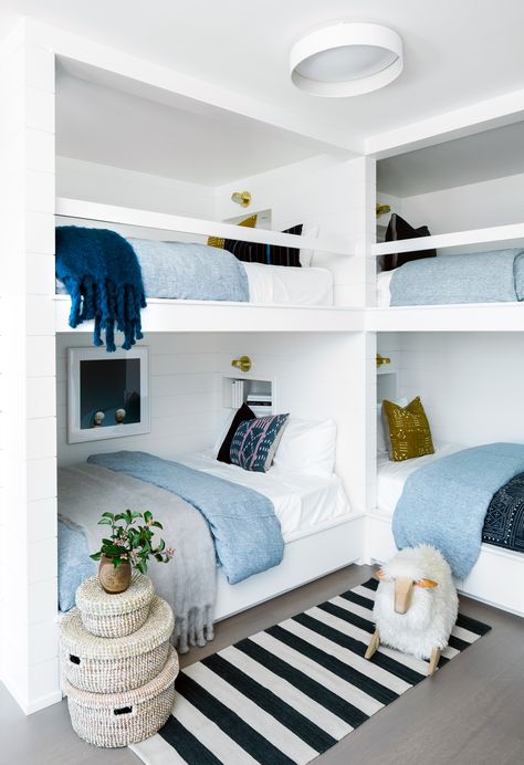 Beachy Minimalism Takes Center Stage in This Breezy Sag Harbor Home Beach Condo Bunk Room, Built In Quadruple Bunk Beds, Beach Bunk Beds, 4 Bunk Beds Built Ins, Bunk Bed Styling, Build In Bunk Beds, 4 Beds In One Room Ideas, Quadruple Bunk Beds, Bunk Room Ideas