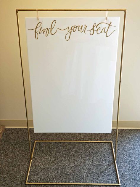 Gold Metal Sign Stand | Elite Events Rental Acrylic Sign Holder Diy, Diy Hanging Sign Stand, Sign Holder Stand Diy, Diy Sign Stand, Wedding Sign Holder, Wedding Table Assignments, Gold Hangers, A Frame Signs, Make Your Own Sign