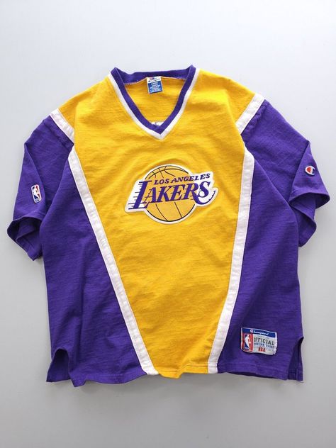 Listing: Vintage 90s Los Angeles Lakers Champion Shooting Shirt L NBA Basketball Kobe Size on Tag: L Flaws: Light staining Measurements: Please see the photos in the listing. If you require additional measurements or information about this item, feel free to send a message. Basketball Kobe, Lakers Outfit, Vintage Basketball Shirt, Basket Nba, Vintage Nba T Shirts, Basketball Tshirt Designs, Lakers Shirt, Vintage Nba Shirt, Oversized Jersey