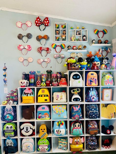 Disney Pin Collections Display, Disney Pin Storage Ideas, Disney Collection Display Home Decor, Loungefly Organization Ideas, Disney Popcorn Buckets Display Ideas, Up Room Decor Disney, Lounge Fly Backpack Display, Disney Souvenir Display, Loungefly Bag Display Wall